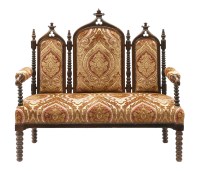 Lot 558 - A French Gothic walnut three-seater settee