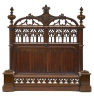 Lot 896 - An extraordinary French Gothic walnut double bed