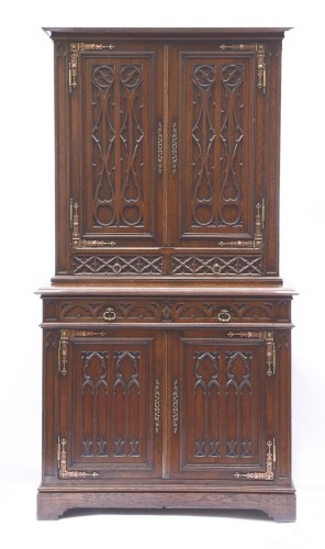 Lot 897 - A French Gothic oak cabinet