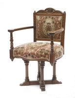 Lot 900 - A Gothic walnut desk chair