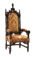 Lot 1011 - A French Gothic walnut throne chair