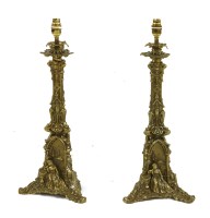 Lot 976 - A pair of bronze table lamps and shades