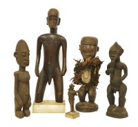 Lot 206 - A group of four carved wooden African tribal figures