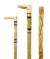 Lot 182 - Three marine ivory and whalebone walking sticks