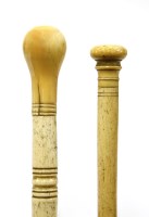 Lot 191 - Two marine ivory walking sticks