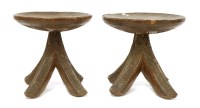 Lot 210 - A matched pair of Igbo wooden stools