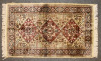 Lot 540A - A collection of five small Persian rugs all having cream fields with all over geometric decoration