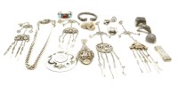 Lot 111 - A collection of oriental silver coloured items