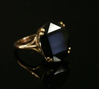Lot 9 - A gold single stone oval cut andalusite ring