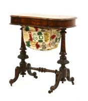 Lot 525 - A Victorian burr walnut sewing table