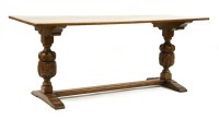 Lot 534 - A 20th century Jacobean style oak refectory table