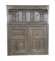 Lot 617 - An oak court cupboard