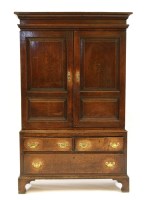 Lot 576 - An oak cupboard