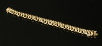 Lot 54 - A 9ct gold four row curb link bracelet