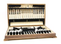 Lot 409 - An oak cased canteen of silver plated King pattern cutlery for six