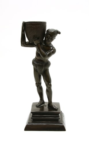 Lot 162 - A bronze figure of an Asian water carrier holding a basket
