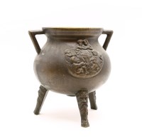 Lot 389 - A bronze cauldron