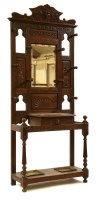 Lot 640 - A Victorian carved oak hallstand