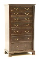 Lot 629 - An Edwardian ebonised wellington chest of seven graduated drawers