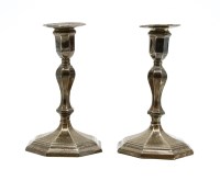 Lot 129 - A pair of late 19th century silver candlesticks