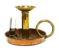 Lot 834 - A novelty 'Giant' copper and brass chamber candlestick and match case holder