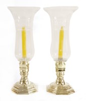 Lot 857 - A pair of Anglo-Indian silver-plated hurricane lanterns