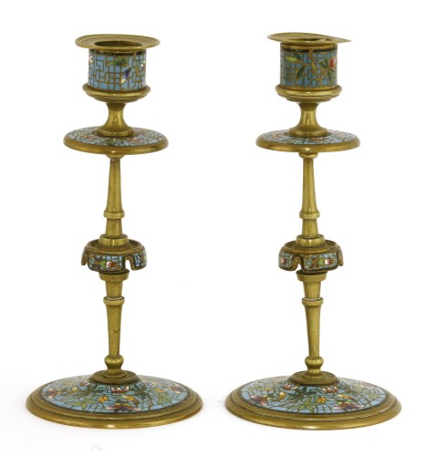 Lot 788 - A pair of French brass candlesticks