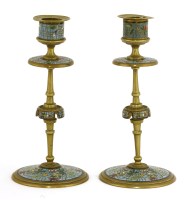 Lot 788 - A pair of French brass candlesticks