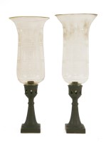 Lot 801 - A pair of late Regency patinated bronze and etched glass hurricane lamps
