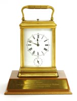 Lot 925 - A Tiffany brass alarm repeat carriage clock