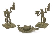 Lot 1029 - An unusual pair of William IV bronze 'Go To bed' candlesticks