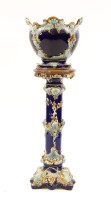 Lot 615 - A Victorian majolica jardinere on stand