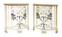 Lot 133 - A pair of Art Deco marble and wrought iron console tables