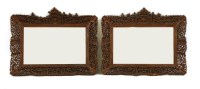 Lot 561A - A pair of early 20th century Chinese wall mirrors