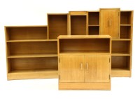 Lot 579 - An Art Deco oak dwarf corner unit