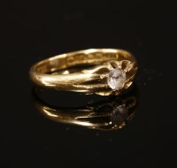 Lot 48 - An 18ct gold single stone synthetic white spinel ring