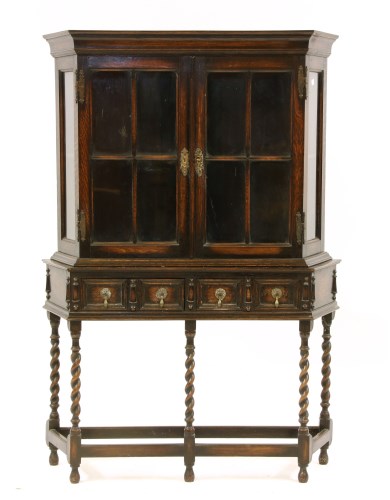 Lot 626 - A small 1920's oak display cabinet