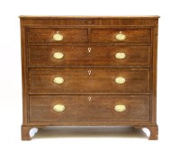 Lot 614 - A George III oak and mahogany chest of drawers