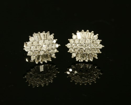 Lot 17 - A pair of white gold diamond cluster stud earrings