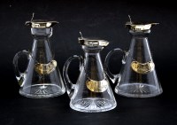 Lot 119 - Three silver mounted whisky noggins