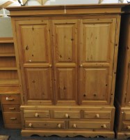 Lot 600 - A pine two door wardrobe