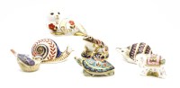 Lot 177 - A collection of seven Royal Derby paperweights