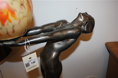 Lot 140 - A silvered figural table lamp