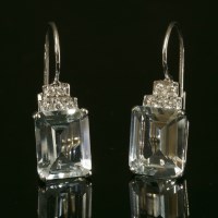 Lot 455 - A pair of Continental white gold aquamarine and diamond drop earrings