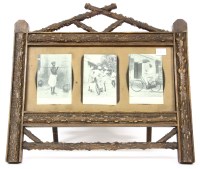 Lot 331 - A rusticated triple photograph frame