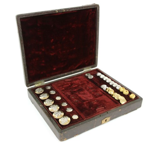 Lot 57 - A Regency leather covered and push fitted button box