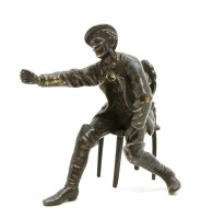 Lot 155 - A bronze figure of an artist