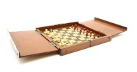 Lot 236 - A Victorian mahogany cased bone travelling chess set