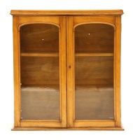 Lot 713 - A Victorian satinwood display cabinet