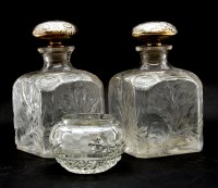 Lot 131 - A pair of Continental engraved glass decanters